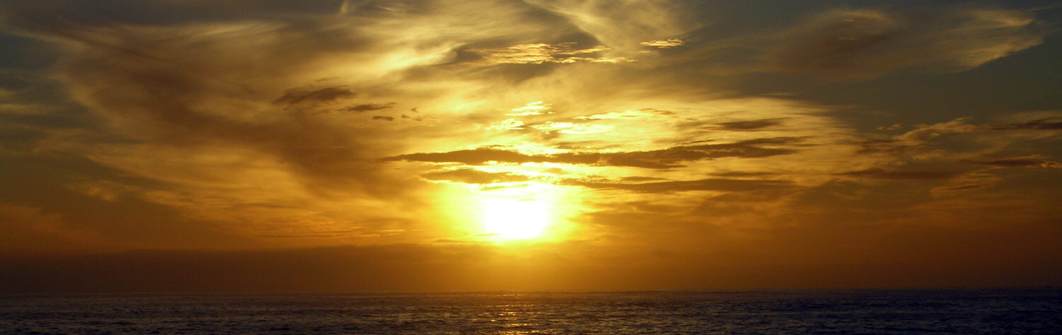 Sole basso sul mare